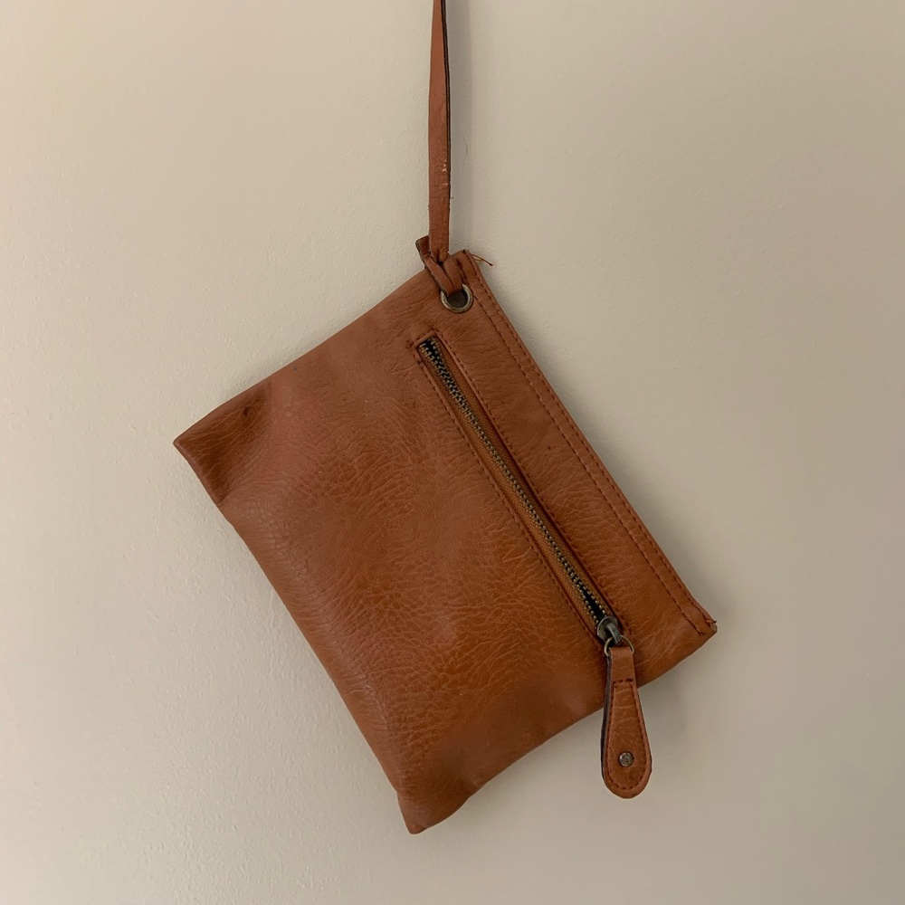Brown leather clutch